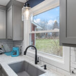 Closeup of sink and window in Dewiit Michigan kitchen remodel from K Fedewa Builders