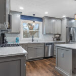 Alternate view of cabinets and more in Dewiit Michigan kitchen remodel from K Fedewa Builders