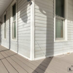 Closeup of siding and decking of Grand Ledge Michigan Covered Porch from K Fedewa Builders