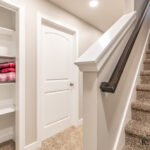 Staircase in Holt Michigan basement remodel from K Fedewa Builders