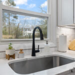 Closeup of sink in Okemos Michigan kitchen remodel from K Fedewa Builders