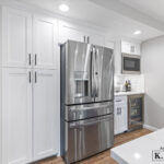 Wide view of fridge area in Okemos Michigan kitchen remodel from K Fedewa Builders