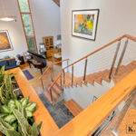 View looing down of Okemos Michigan wooden staircase renovation from K Fedewa Builders