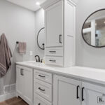 Wide view of dual vanity in St Johns Michigan master bathroom remodel from K Fedewa Builders