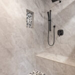 Inside of new walk-in shower of St Johns Michigan master bathroom remodel from K Fedewa Builders