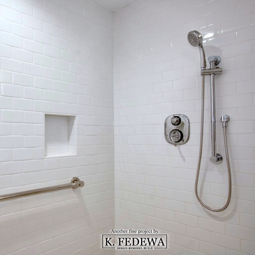 Grab bar and handheld-shower wand in Grab bar in bathroom for Aging-in-place from K. Fedewa Builders