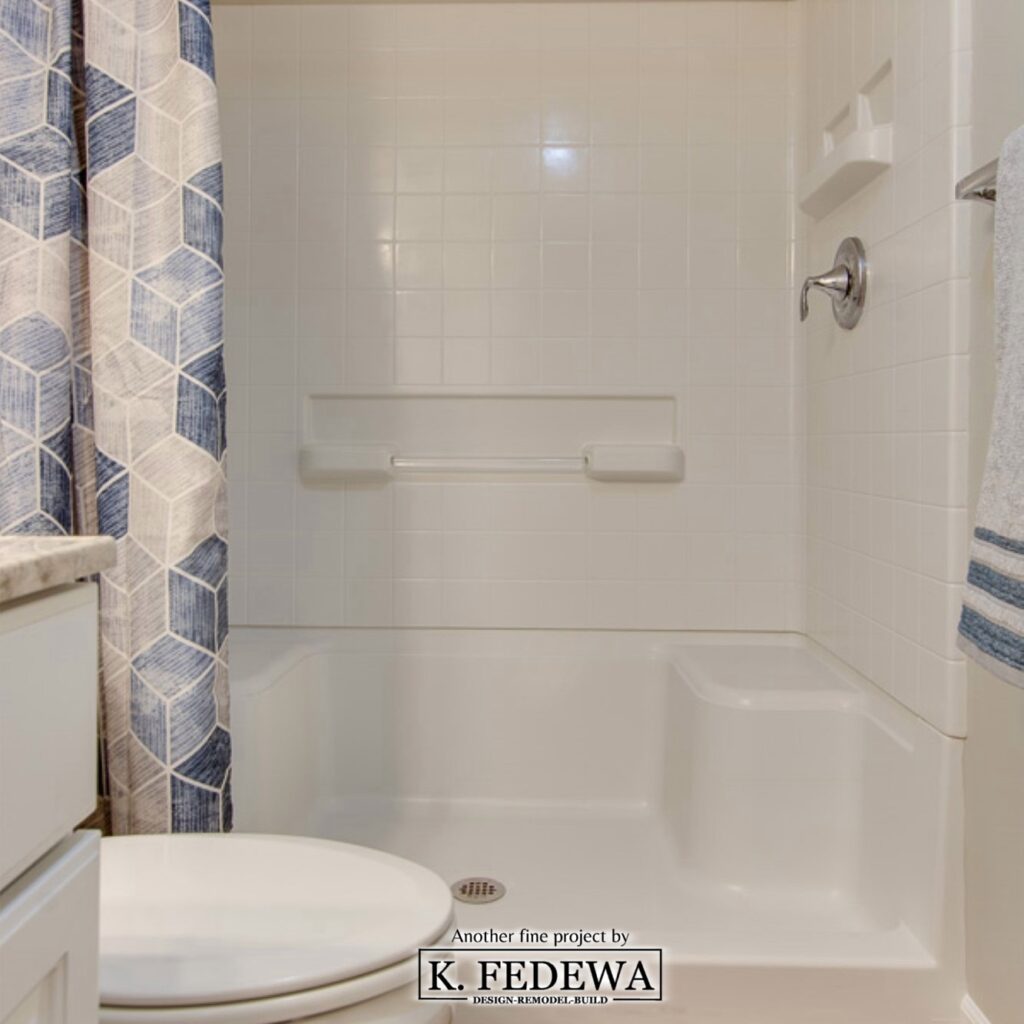 Bathroom shower with built-in seats for aging-in-place by K. Fedewa Builders