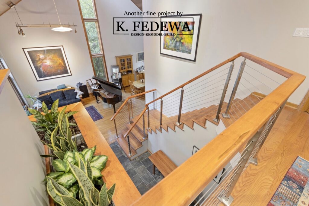 After Photo of refreshed Lansing, MI staircase by K Fedewa Builders