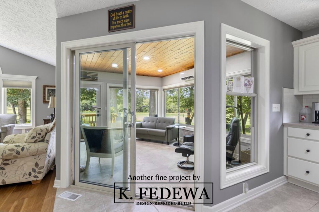 Entrance from kitchen to new four-seasons room in Bath, MI from K. Fedewa Builders