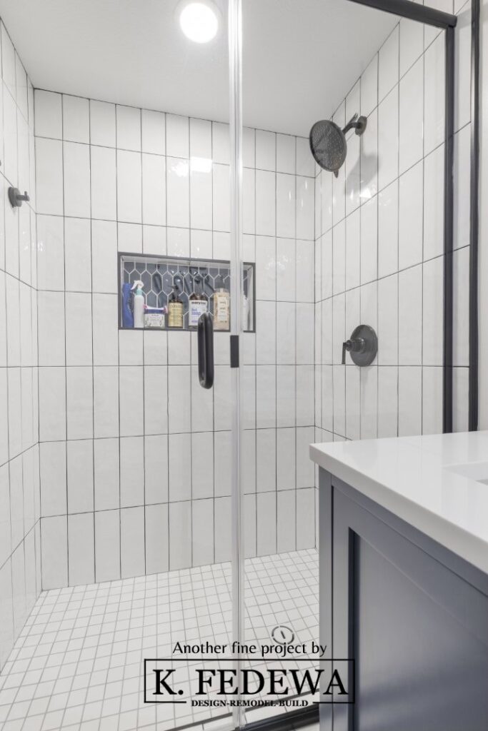 Large white-tile shower after remodel from K. Fedewa Builders