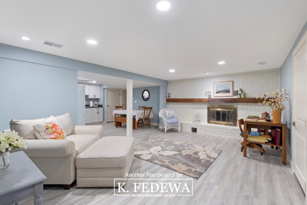 Finished basement in Holt, MI showing a remodeled living room area.