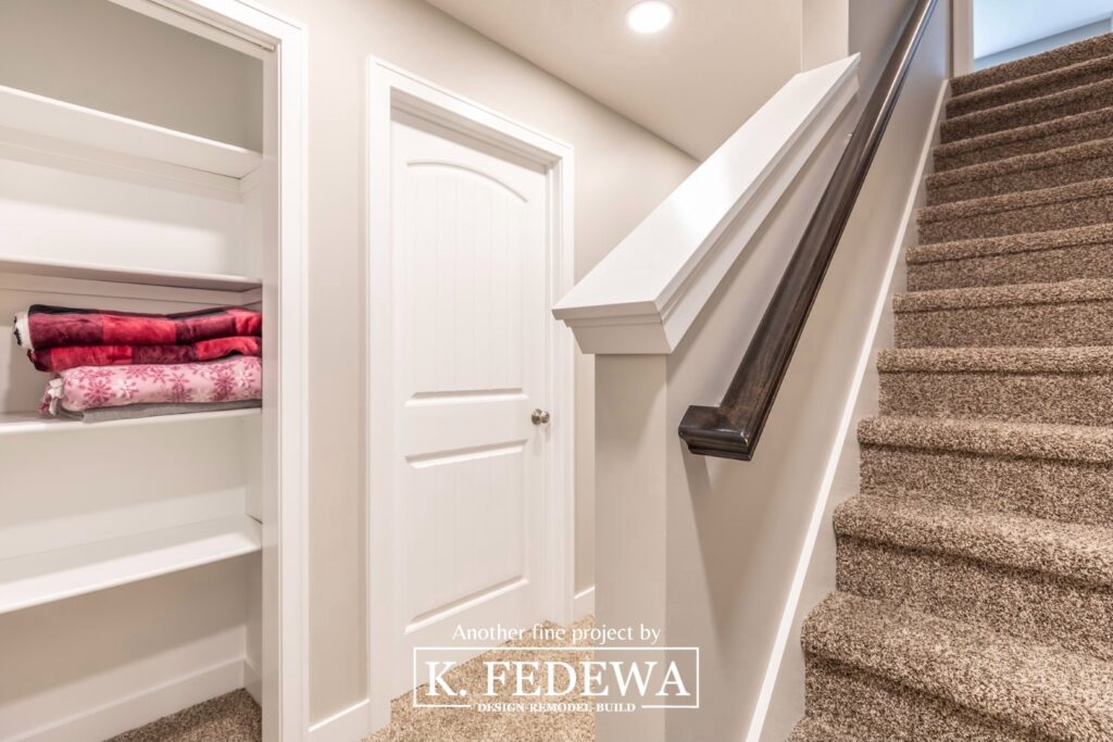 Storage shelves and closet in Holt, MI finished basement.