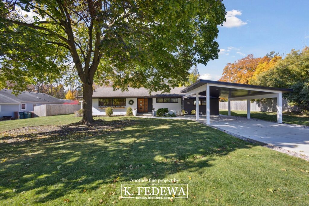 East Lansing, MI garage to bedroom conversion after photo with carport addition.