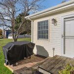 Four season room remodel in Lansing MI by K Fedewa Builders - view of back door of addition