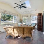 Four season room remodel in Lansing MI by K Fedewa Builders - interior view facing windows