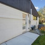 Garage to Bedroom Conversion in East Lansing by K Fedewa Builders - Exterior Side of House