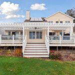 Pergola from K Fedewa Builders in Laingsburg MI - view of entire deck and pergola as if standing on the ground straight-on