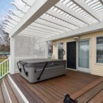 Pergola from K Fedewa Builders in Laingsburg MI - view of hot tub and sliding door as if standing on deck